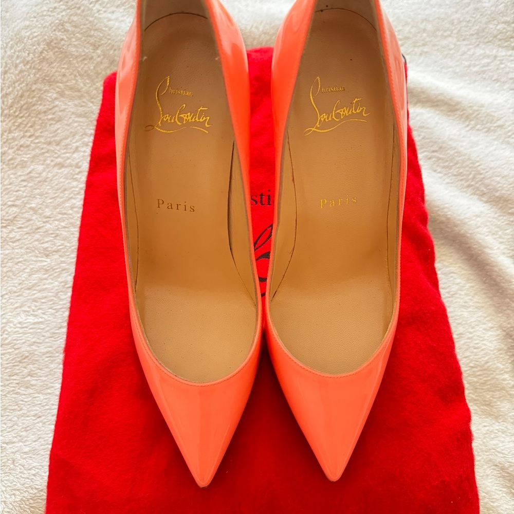 Christian Louboutin Pigalle Follies 100 Patent in Flamingo. Size 6.5